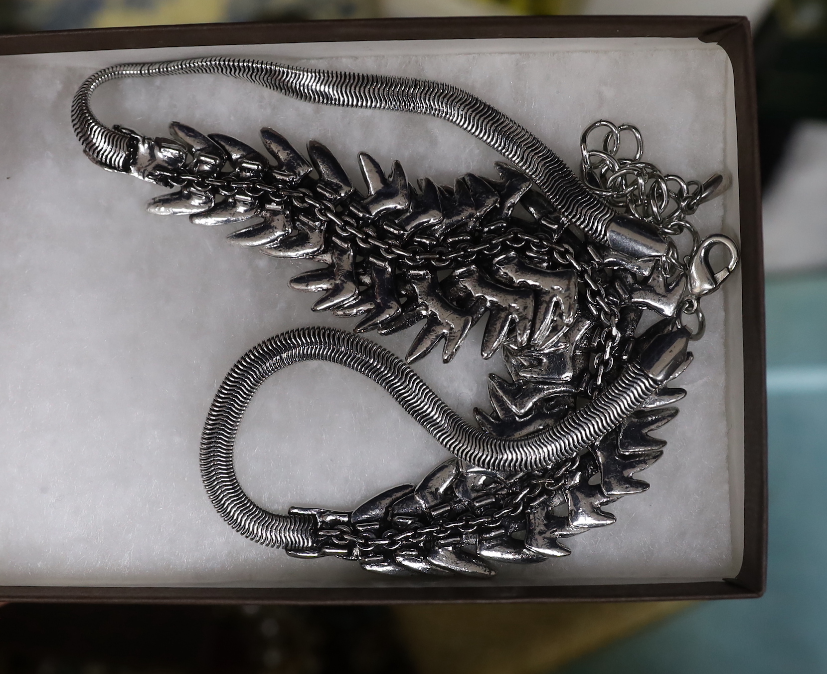 Costume jewellery including a case of earrings.